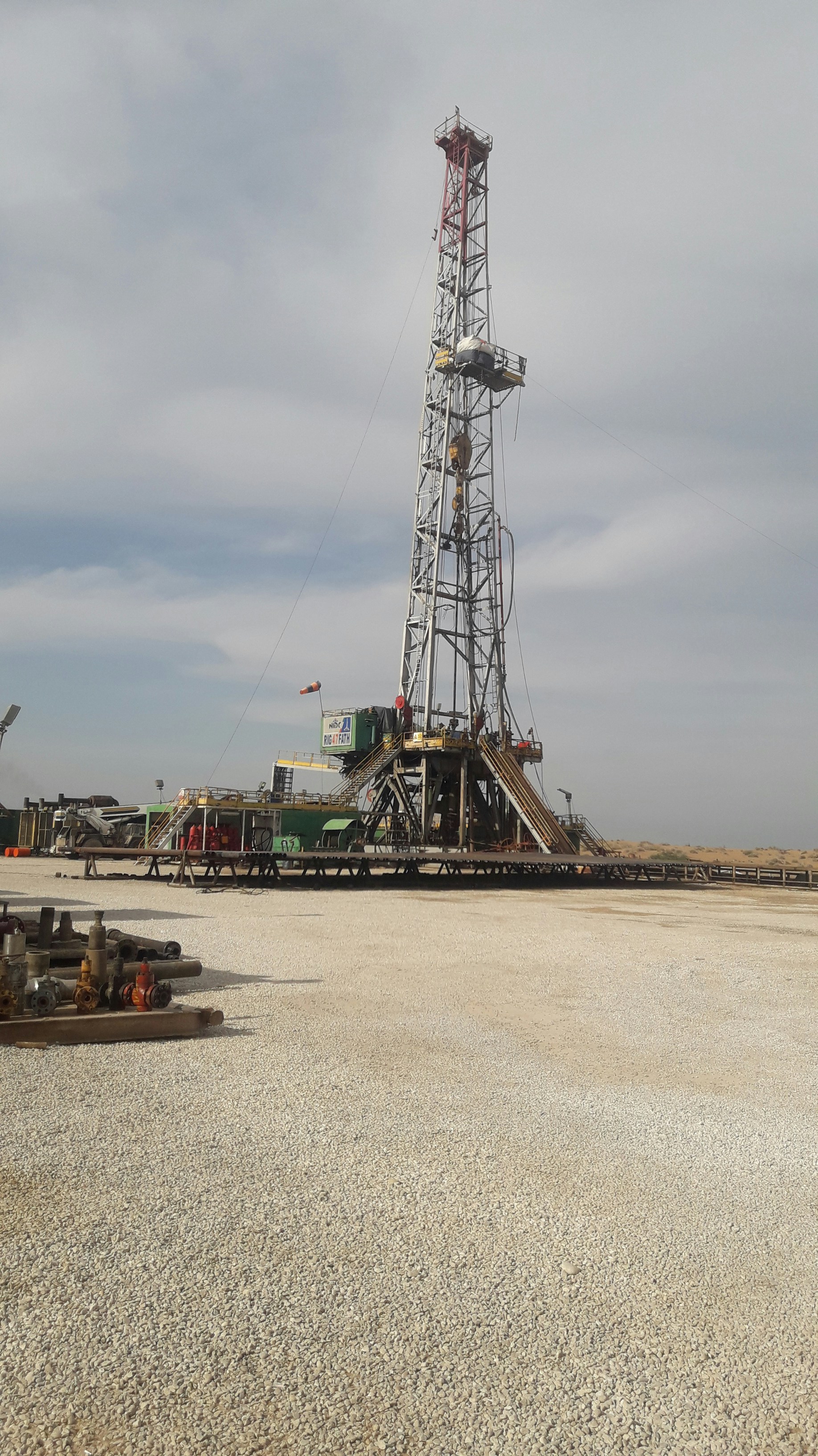 Onshore drilling rig in a desert exploration setting